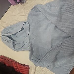 Cropped long sleeve ribbed sweater